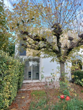 Maison spacieuse avec jardin
